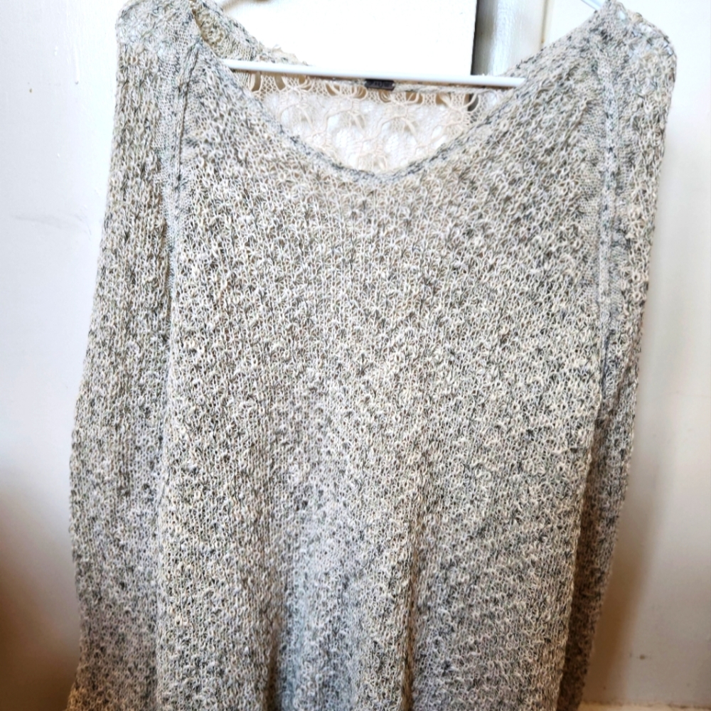 Women's sweater with crochet back